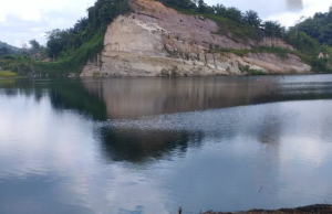 Indahnya Pesona Wisata Alam Desa Purwajaya, Ada Danau Biru dan Fosil Pohon Raksasa